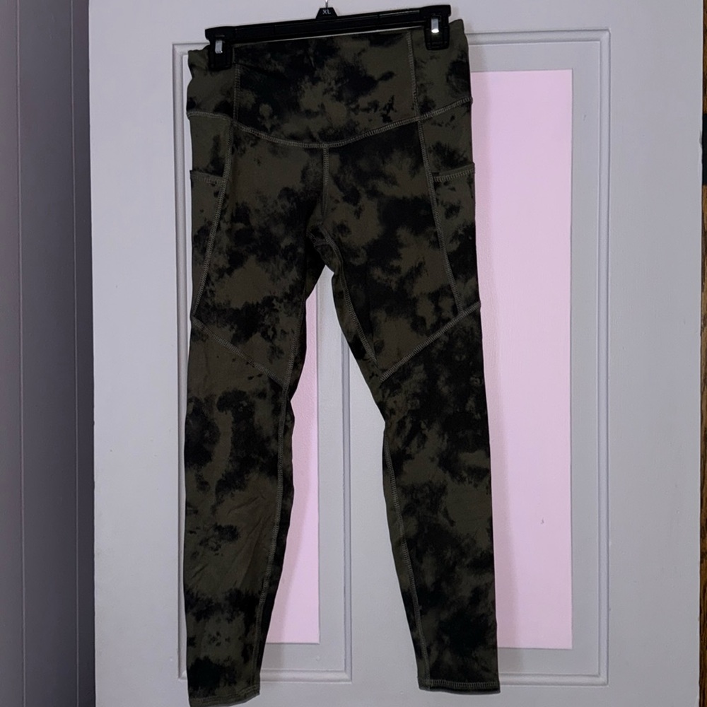 green and black patterned leggings